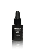 Brickell Men's Products Vitamin C Booster serum bottle with a black dropper cap and white text on a black label.