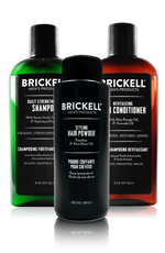 Brickell Men’s Products Fuller Hair Bundle: Daily Strengthening Shampoo (green bottle), Revitalizing Conditioner (amber bottle), and Styling Hair Powder (black bottle)